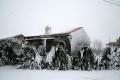 Snow-covered little houses in Alcublas