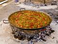 Valencian rice dish with meat and vegetables to the firewood in Teulada